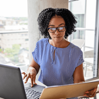 woman at desk Virtual Communication and Collaboration